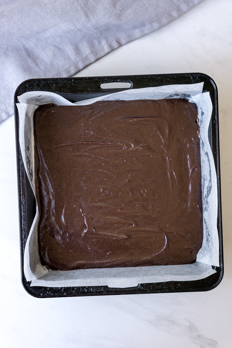chocolate brownie batter in pan