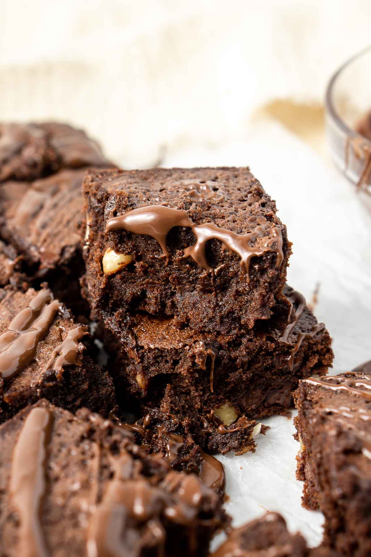 Close up of dairy free chocolate brownies with a bite taken.