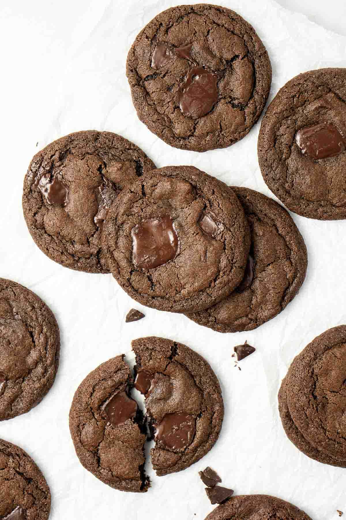 Dark chocolate chunk cookies from above stacked on top of each other.