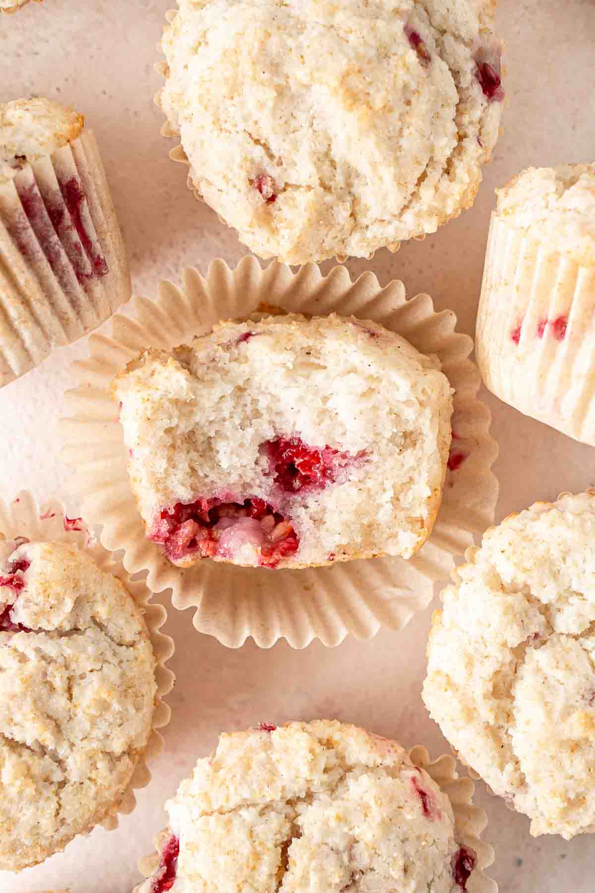 Close up of the inside of a gluten free raspberry muffin.