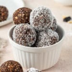 The chocolate and cherry balls in a ramekin.