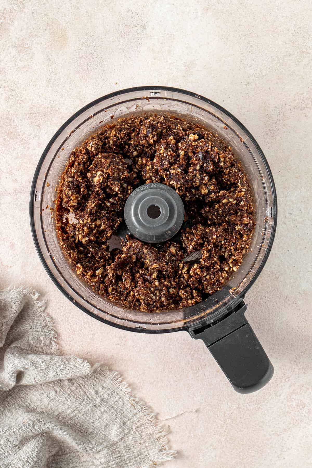 The date and nut mixture chopped in the food processor.