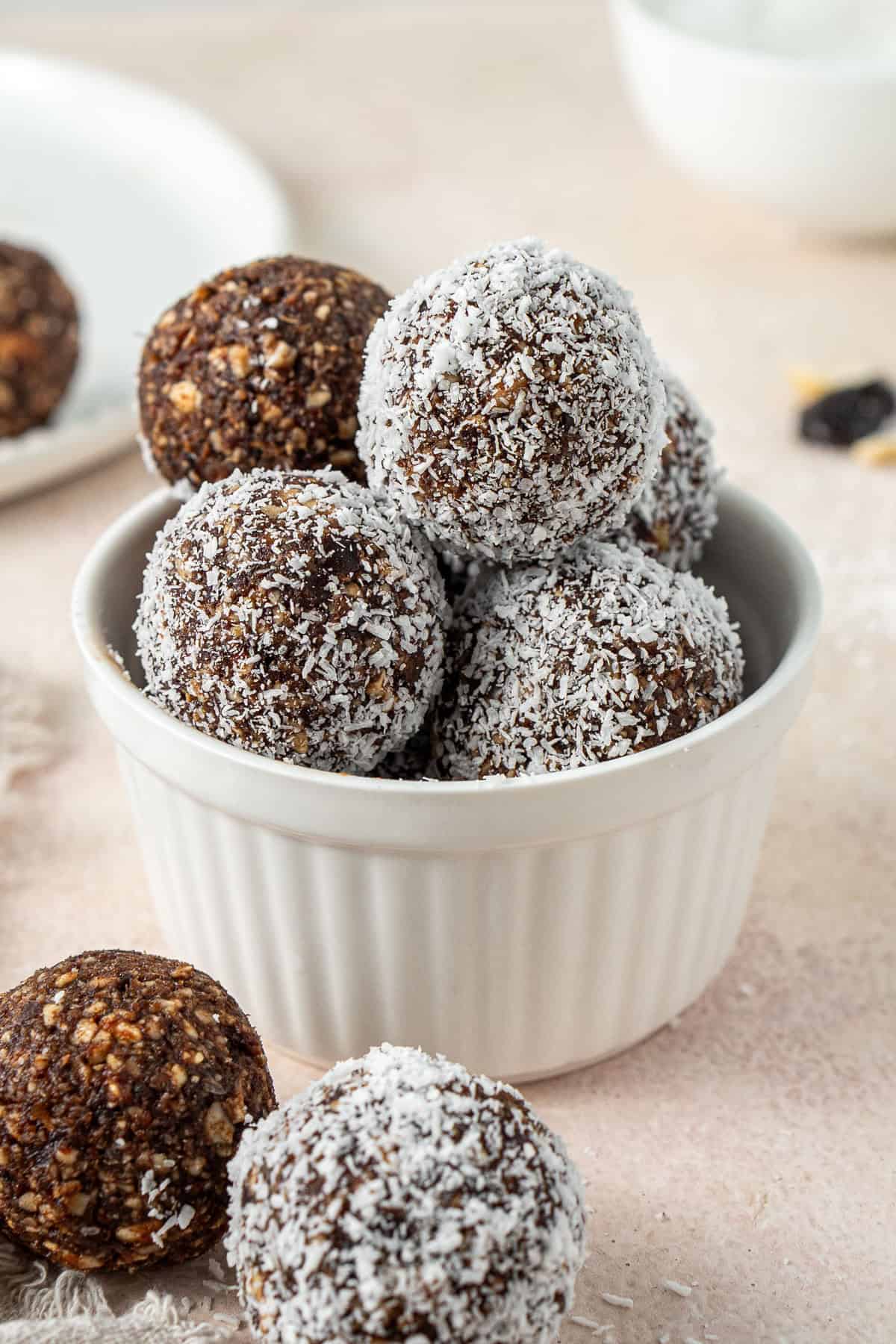 The chocolate and cherry balls in a ramekin.