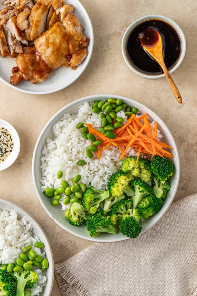 Assembling the rice and veg in a bowl.