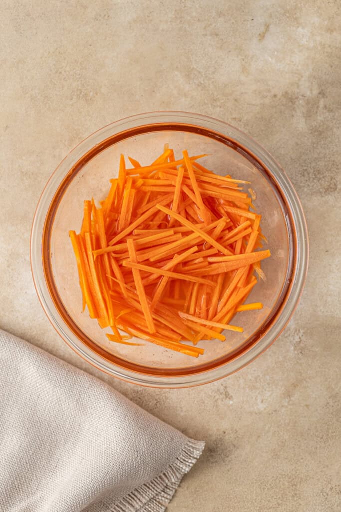 The pickled carrots in a bowl.