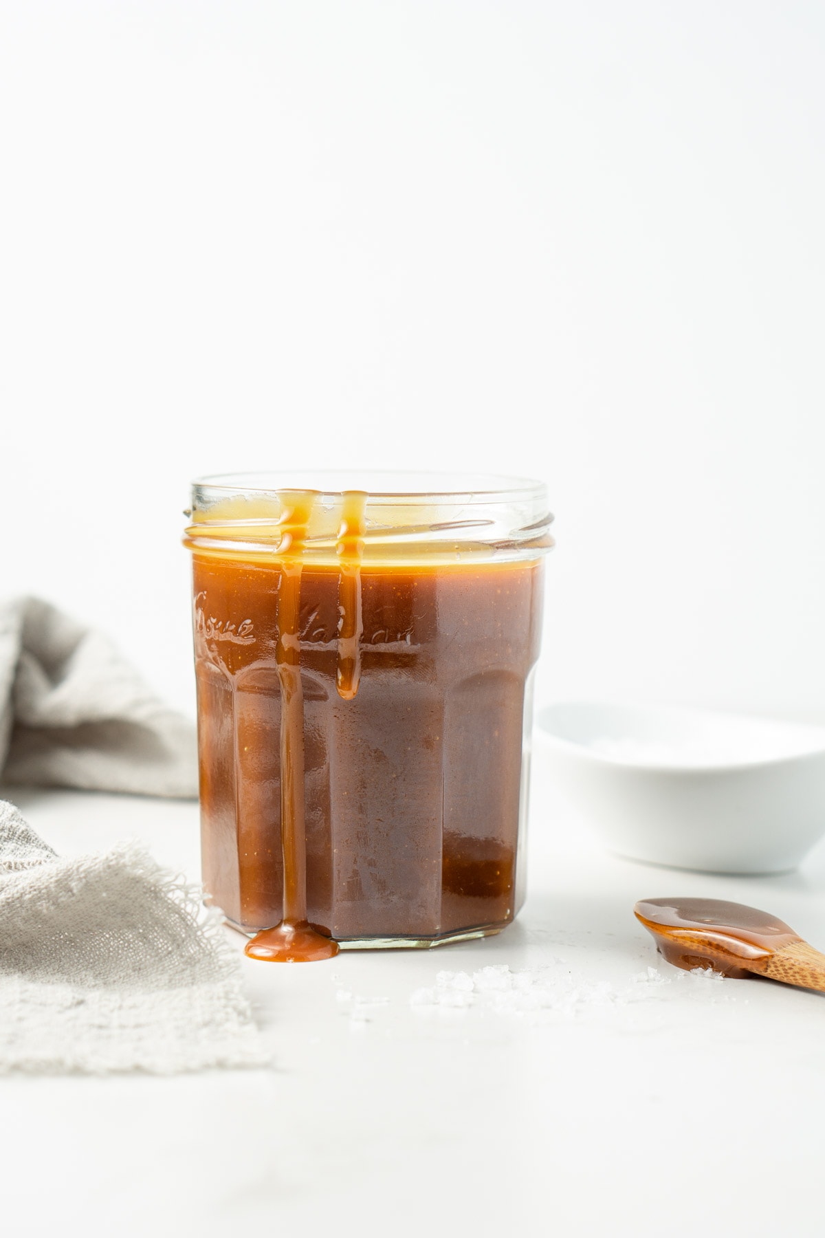 salted caramel sauce in a glass jar.