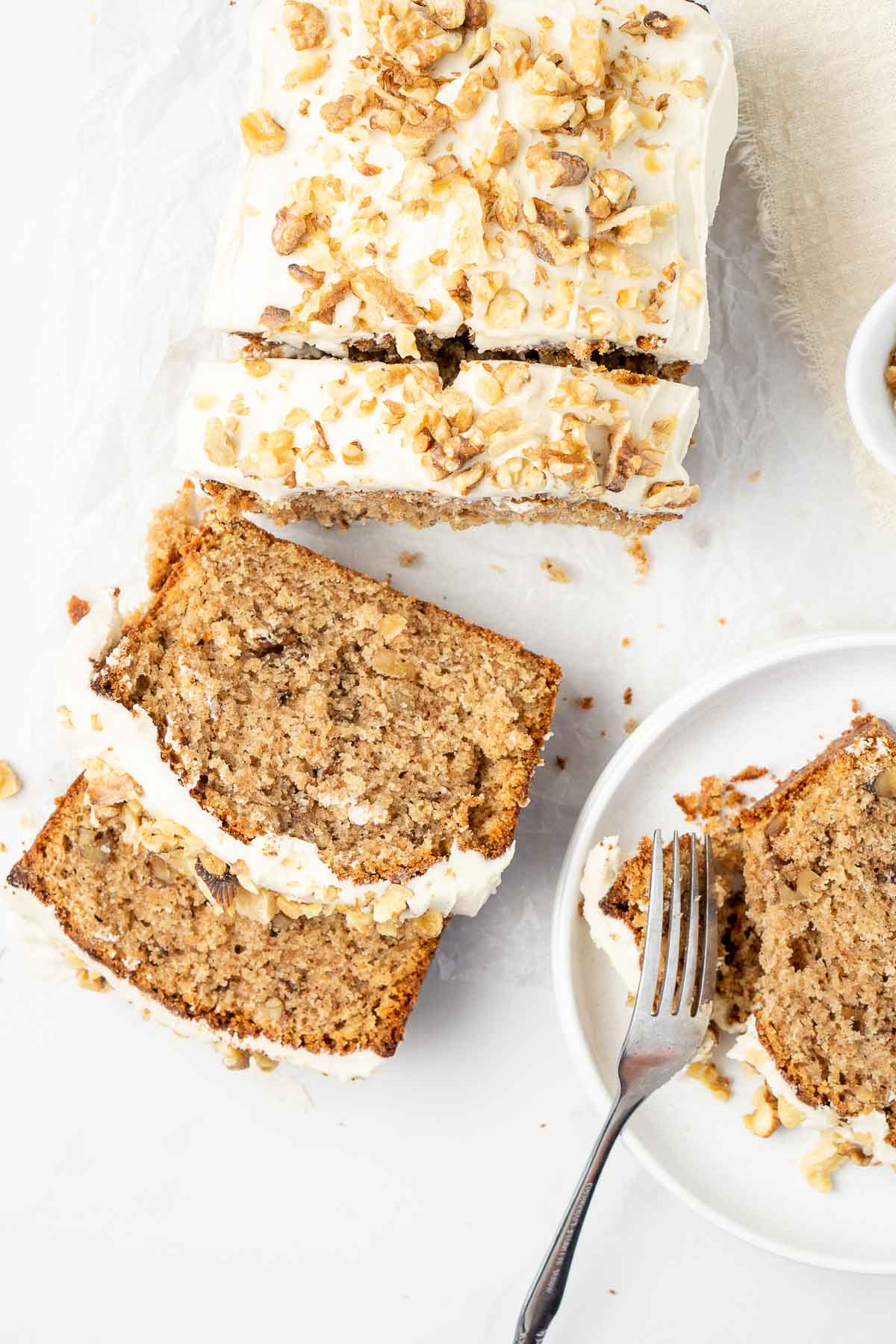 Sliced coffee and walnut cake from above.