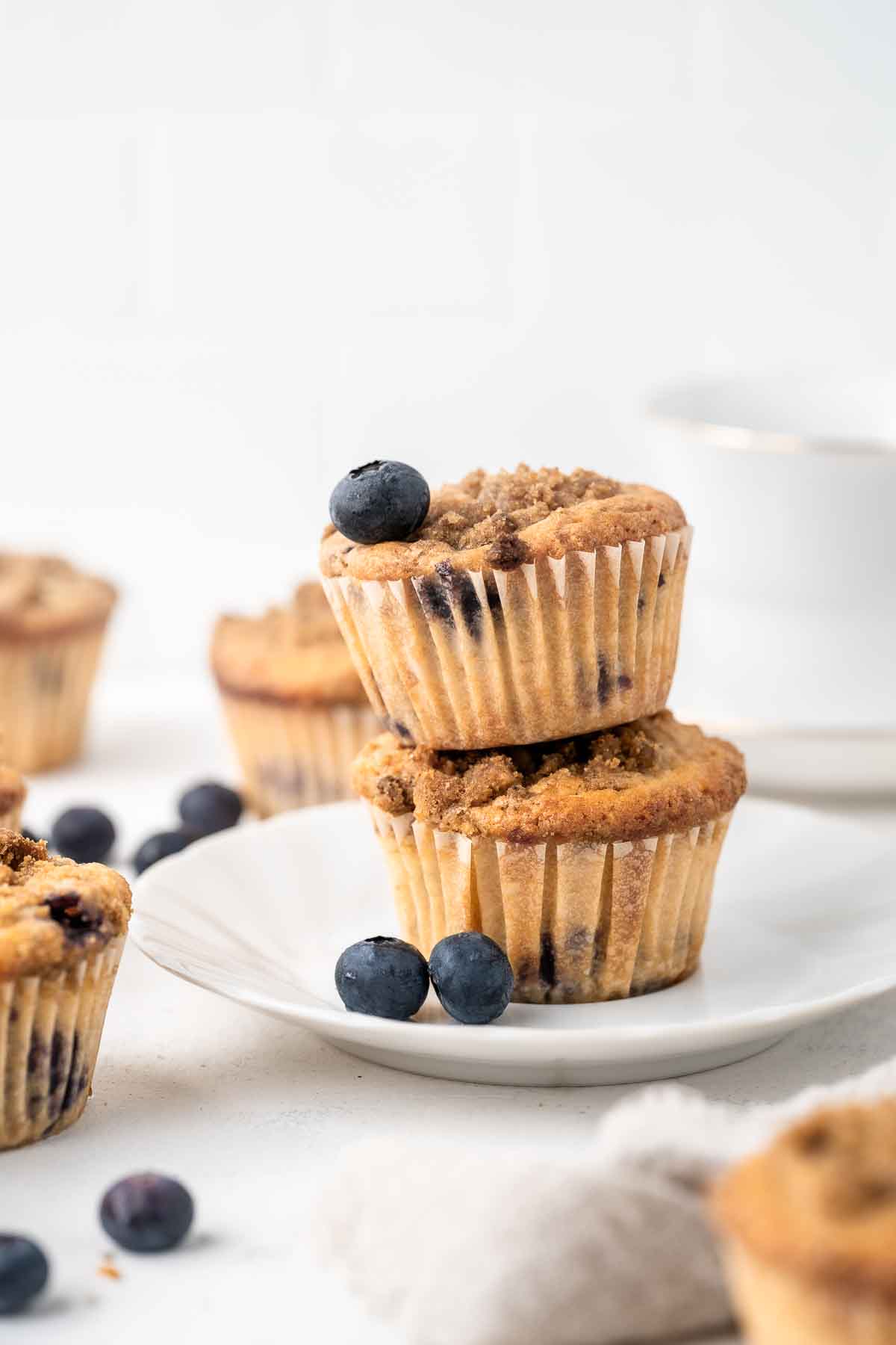 Blueberry earl grey muffins with fresh blueberries.