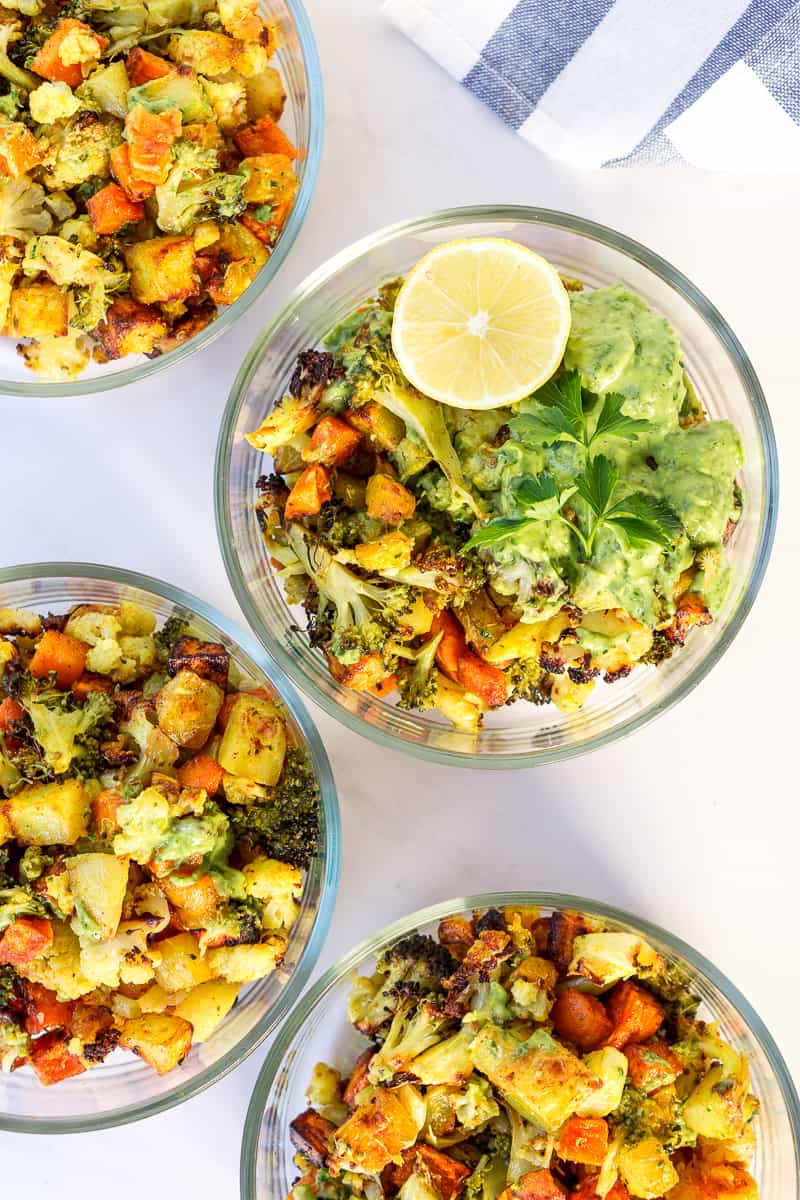 meal prep of roasted veggie bowls with green goddess sauce