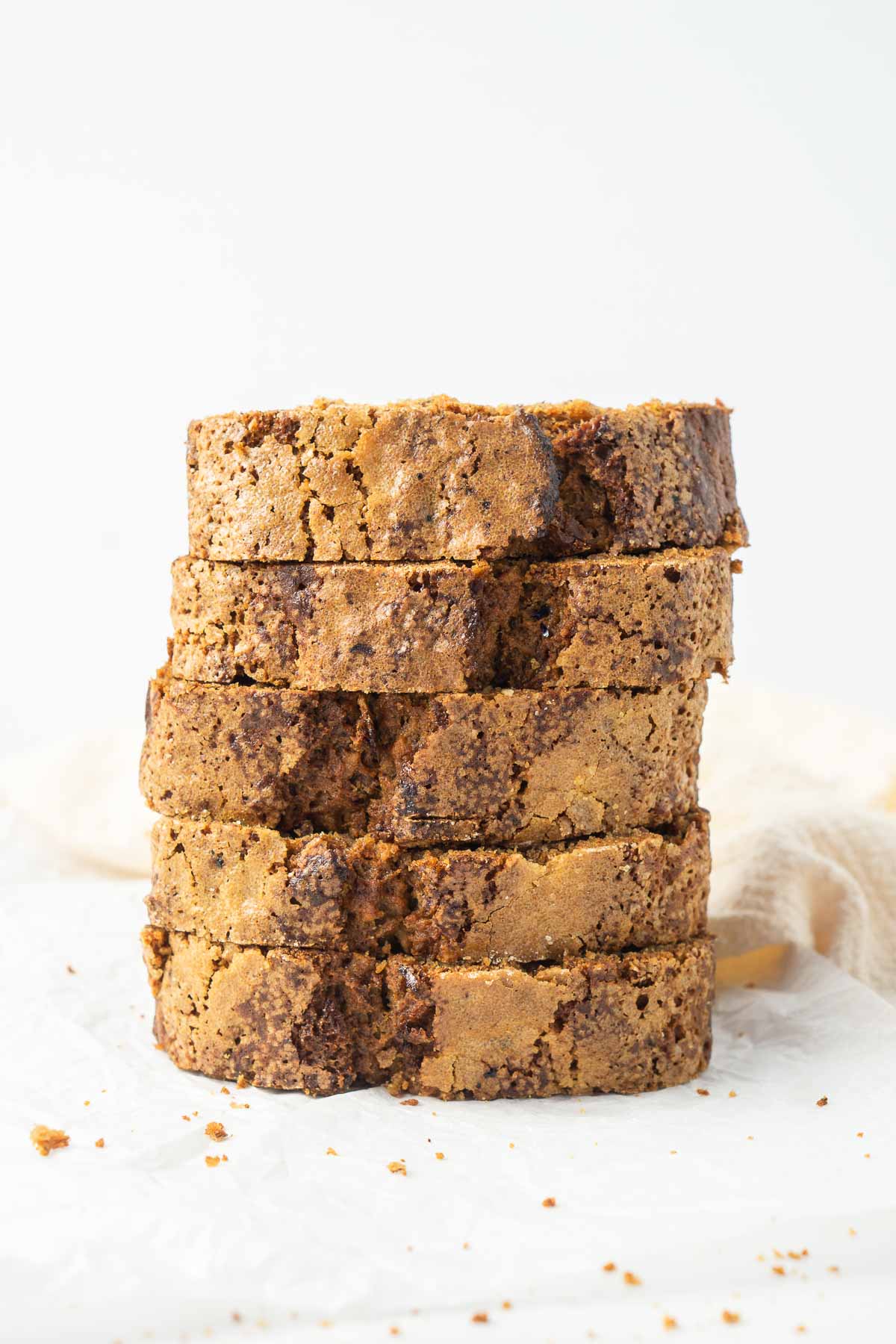 Close up of slices of vegan banana bread stacked up.