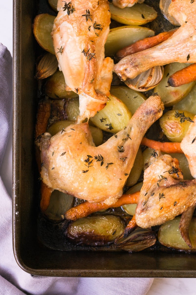 Close up of Roast Chicken and vegetables in pan