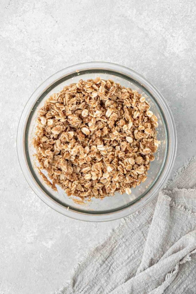 Crumble topping mixed together in a glass bowl.