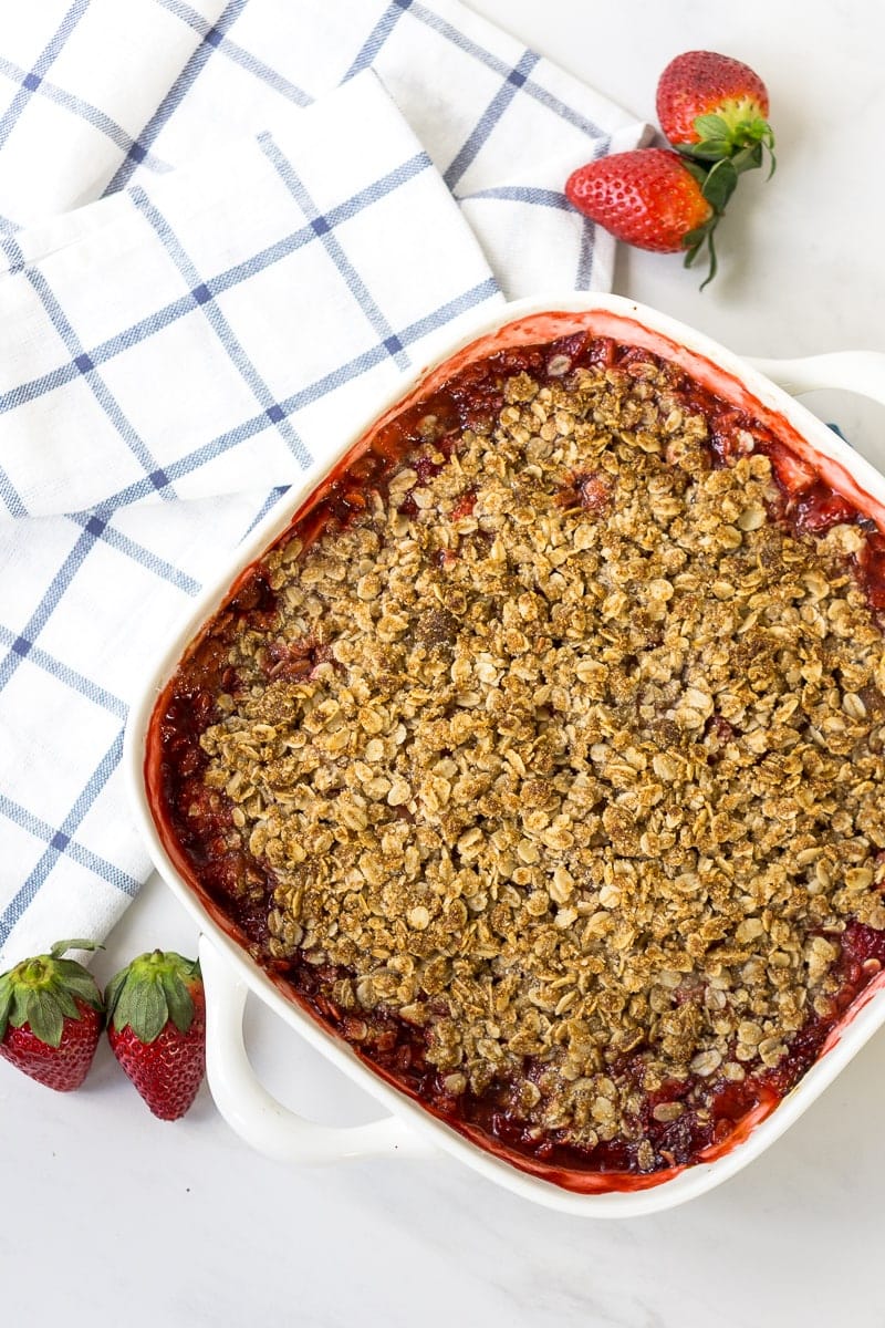 Strawberry crumble in baking dish fresh from the oven