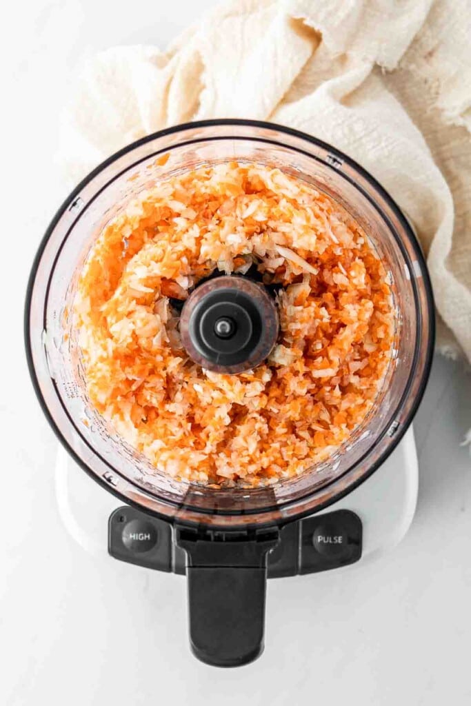 Onion, carrot and garlic chopped in a food processor. 