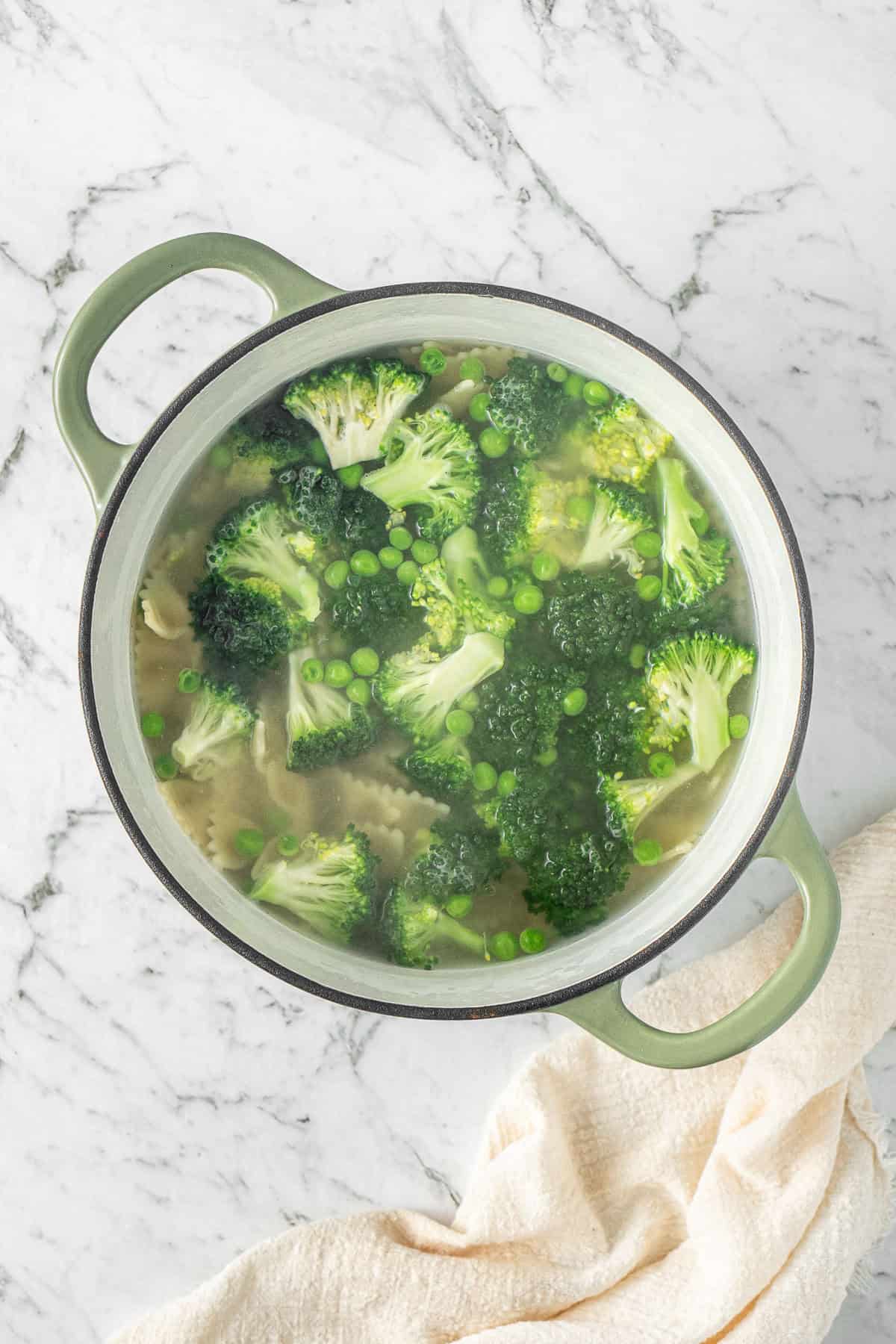 The greens added to the pot.