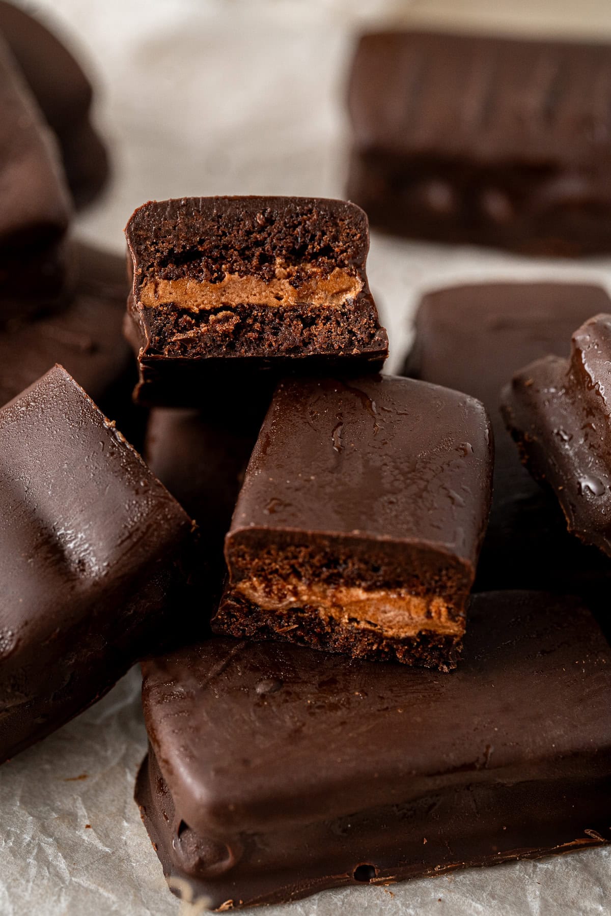 Close up  of the interior of the tim tams showing the choc malt filling.