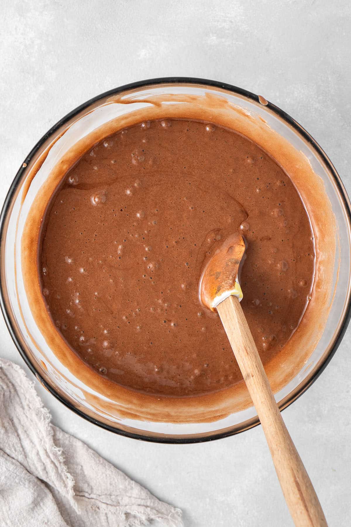 The cake batter with the eggs whites folded through with a spatula. 