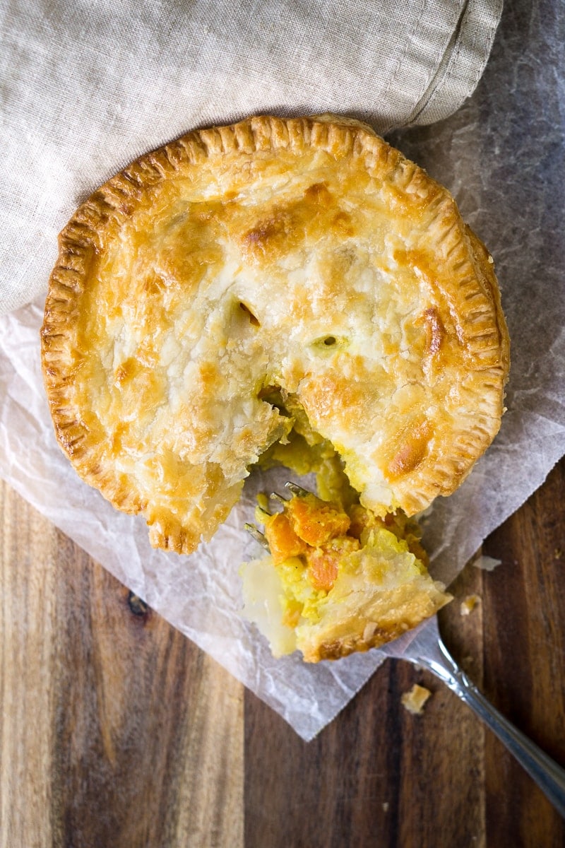 vegetable curry pie with forkful taken 