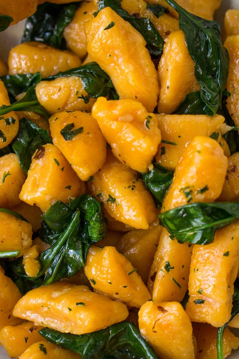 Close up of sweet potato gnocchi and spinach