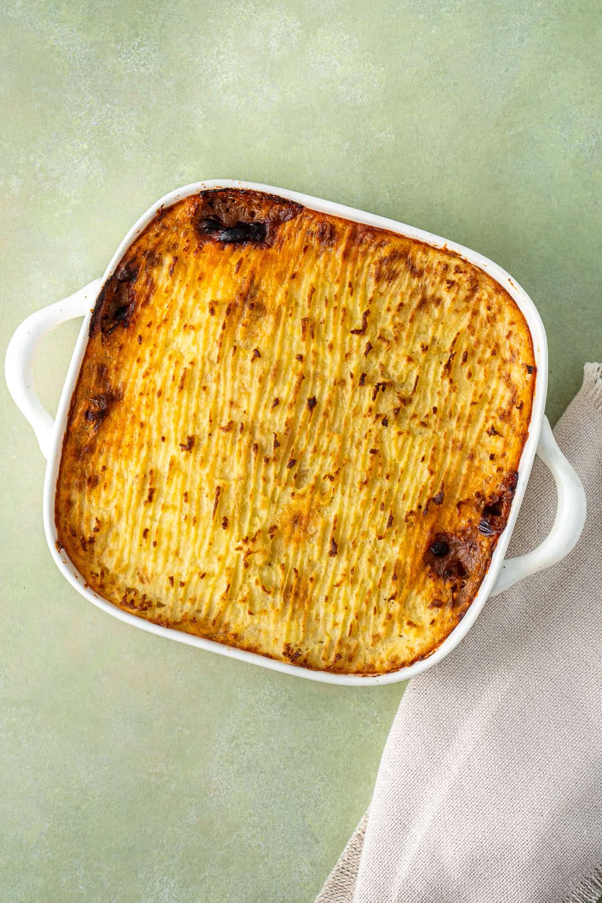 Cottage pie baked and golden brown on top.