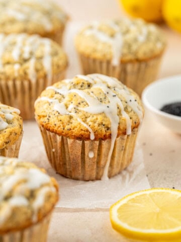 Dairy free lemon poppy seed muffins with a lemon drizzle.
