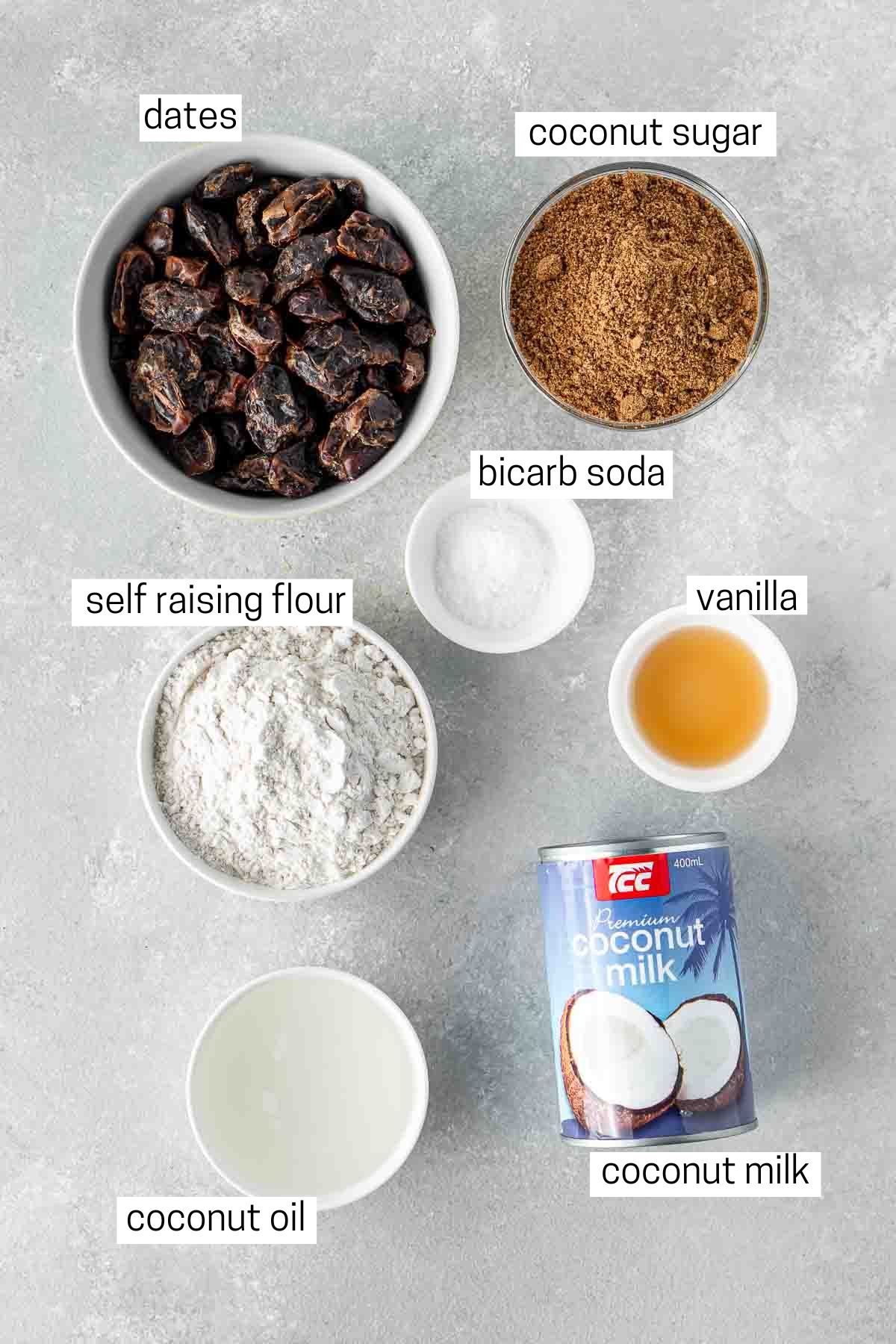 All ingredients needed for vegan sticky date pudding laid out in bowls.