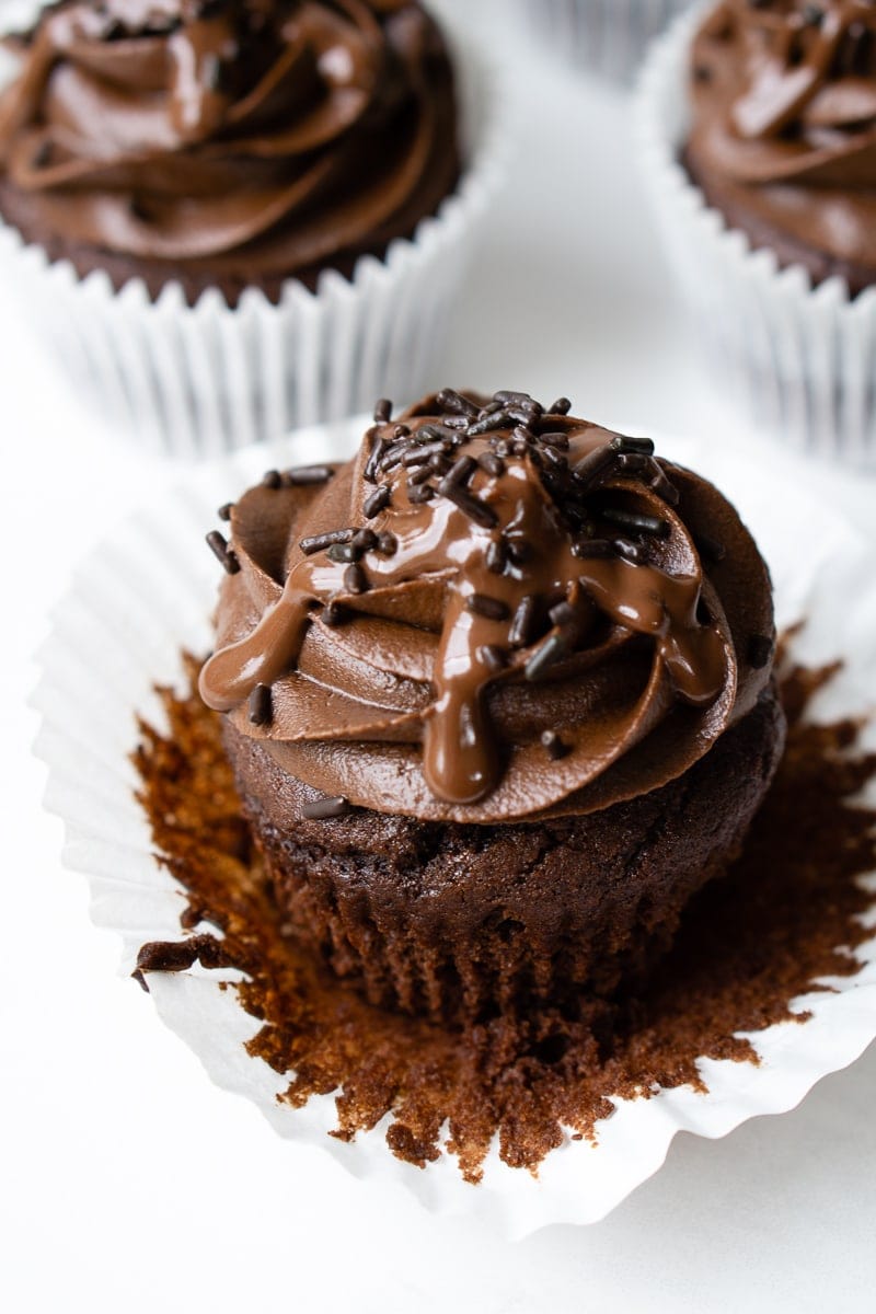 vegan chocolate ganache on chocolate cupcakes