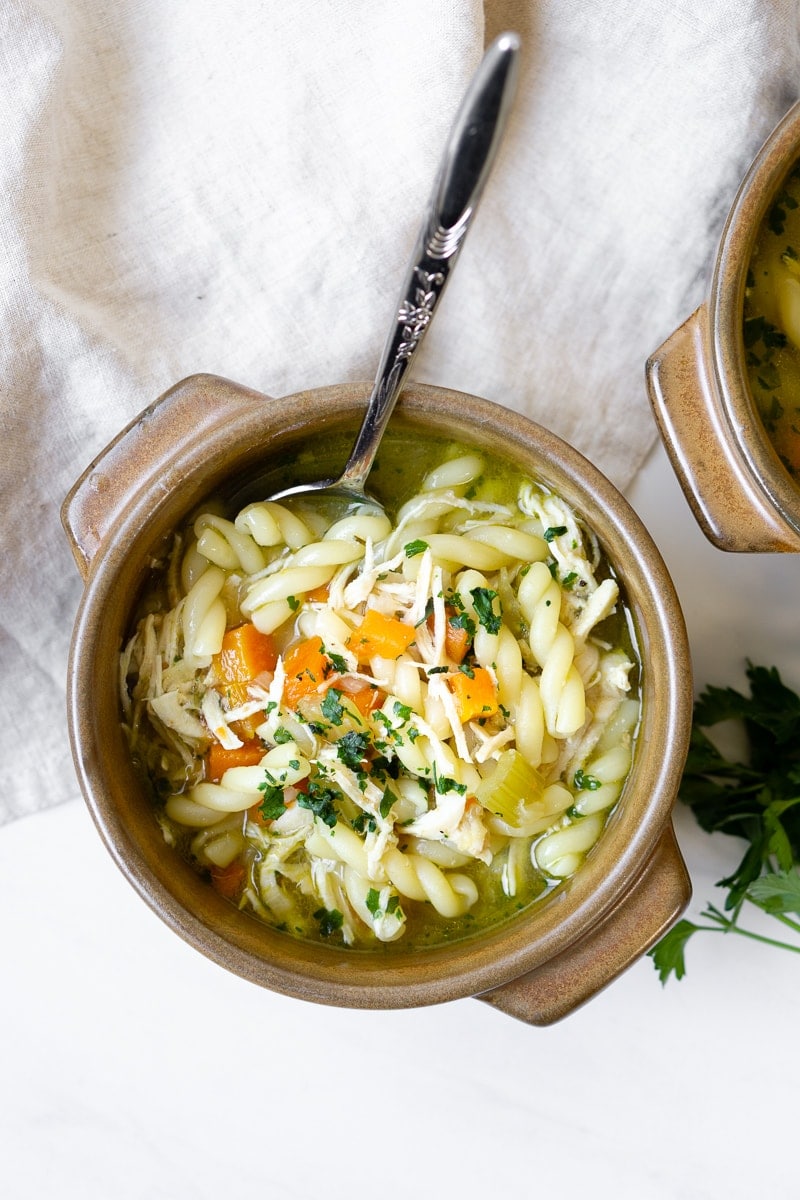 Pressure Cooker Chicken Soup with spoon