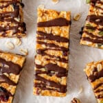 No bake peanut butter muesli bar drizzled with chocolate.