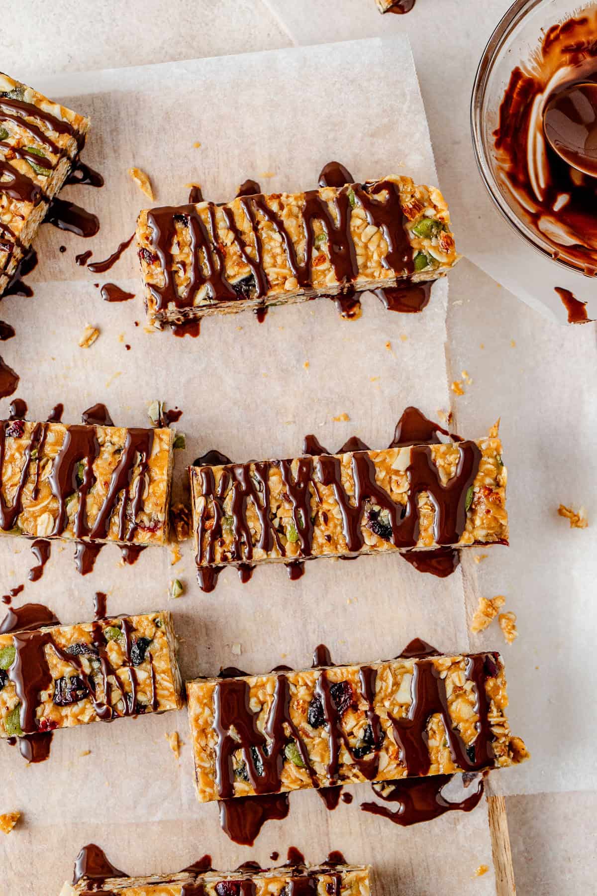 The chocolate drizzled over the cut bars.