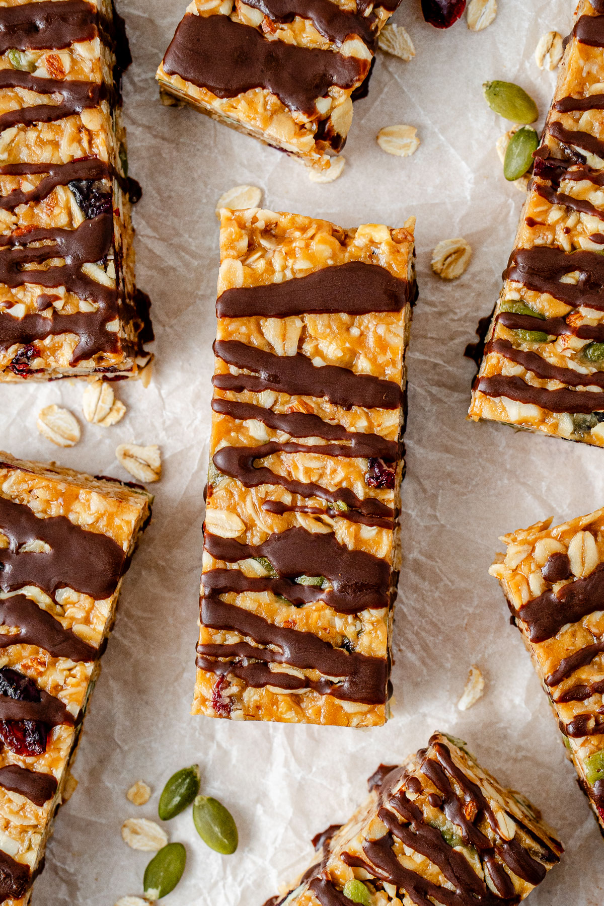 No bake peanut butter muesli bar drizzled with chocolate.