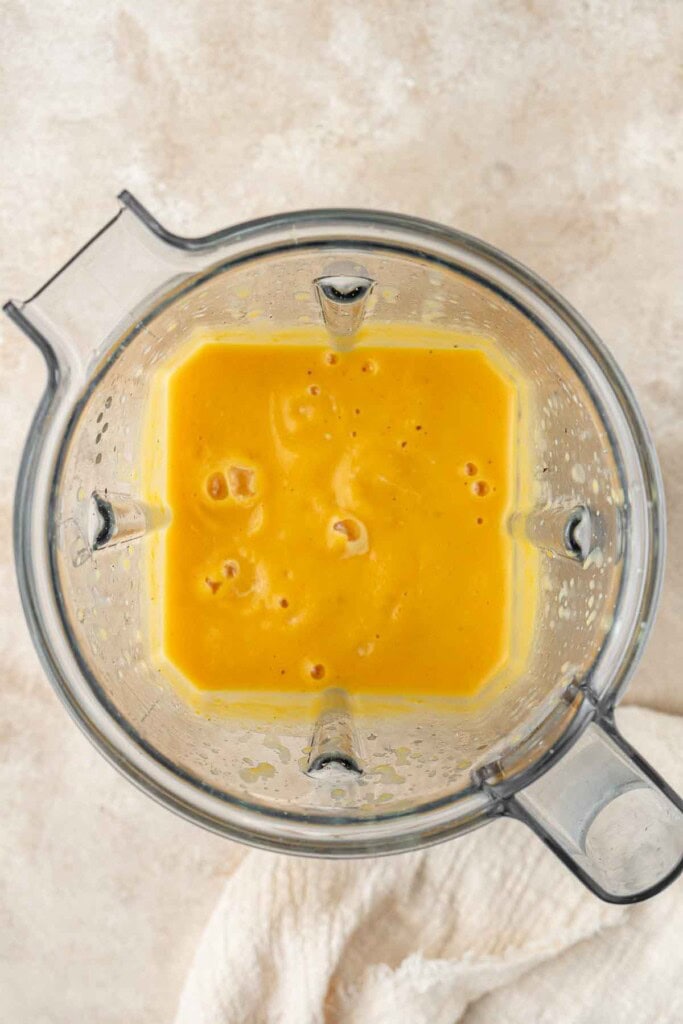 Blended pumpkin sauce in a blender.