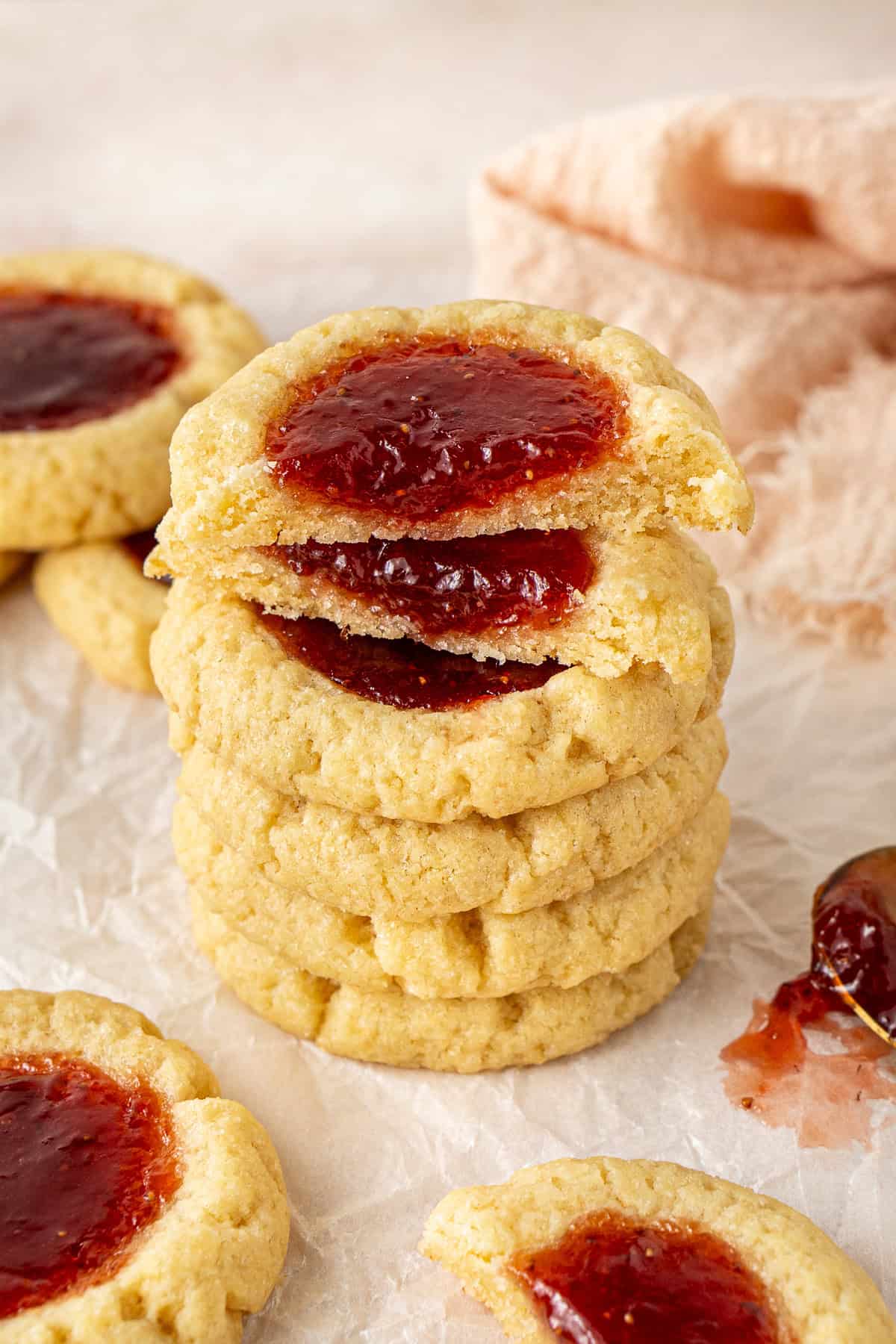 Thumbprint cookies stacked on top of each other.