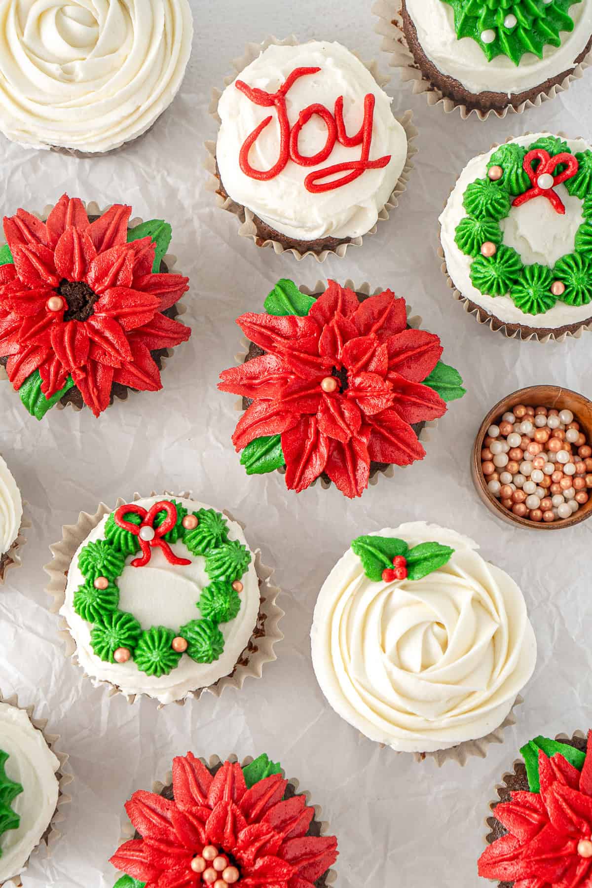 The chocolate gingerbread cupcakes decorated with different christmas designs. 