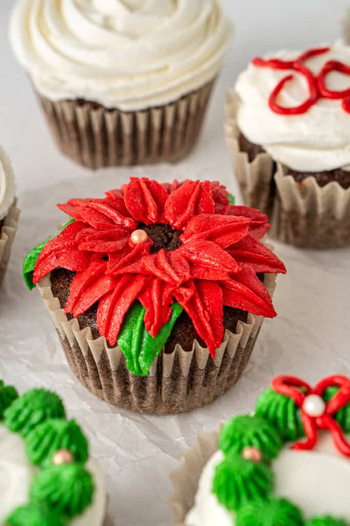 The finished poinsettia decorated cupcake.