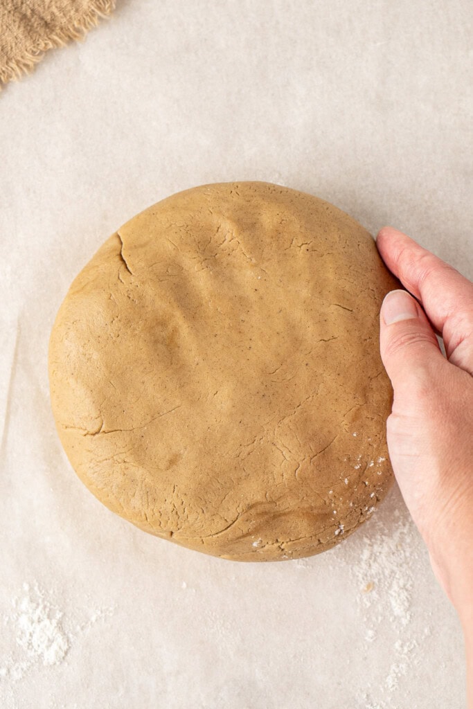 Shaping the cookie dough into a ball.
