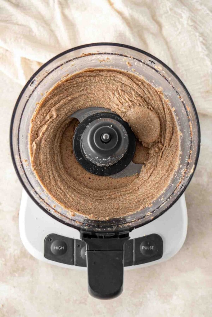 Almond butter smooth in the food processor.