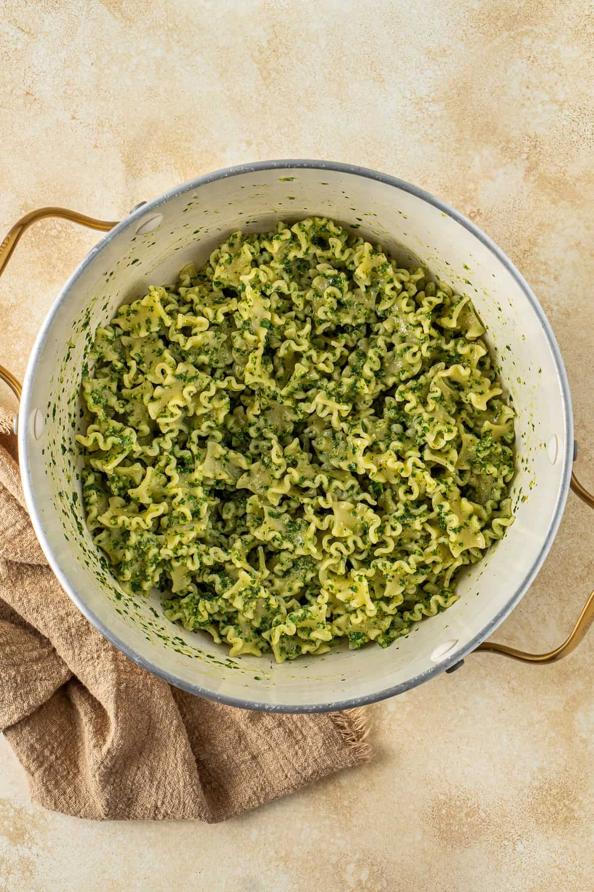 The pasta in a pot tossed with the kale walnut pesto.