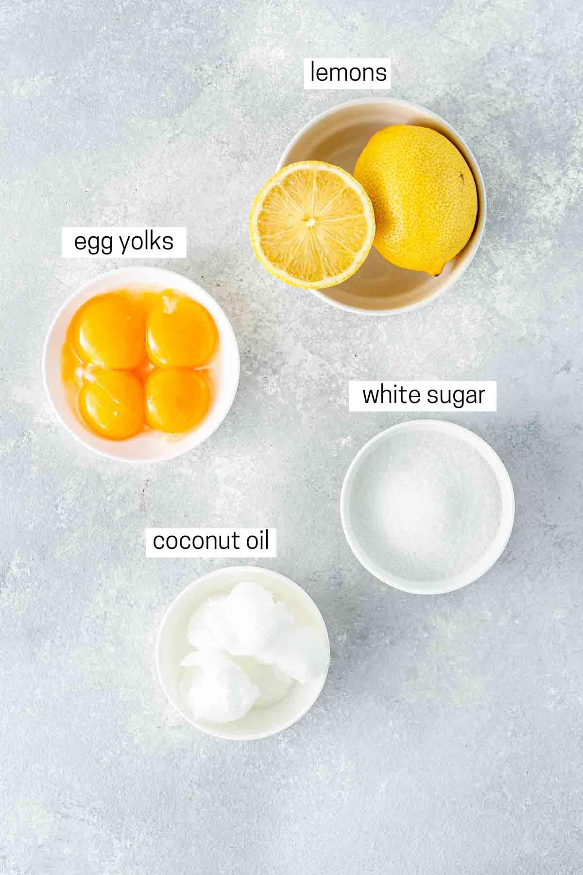 All ingredients needed for dairy free lemon curd in small bowls.