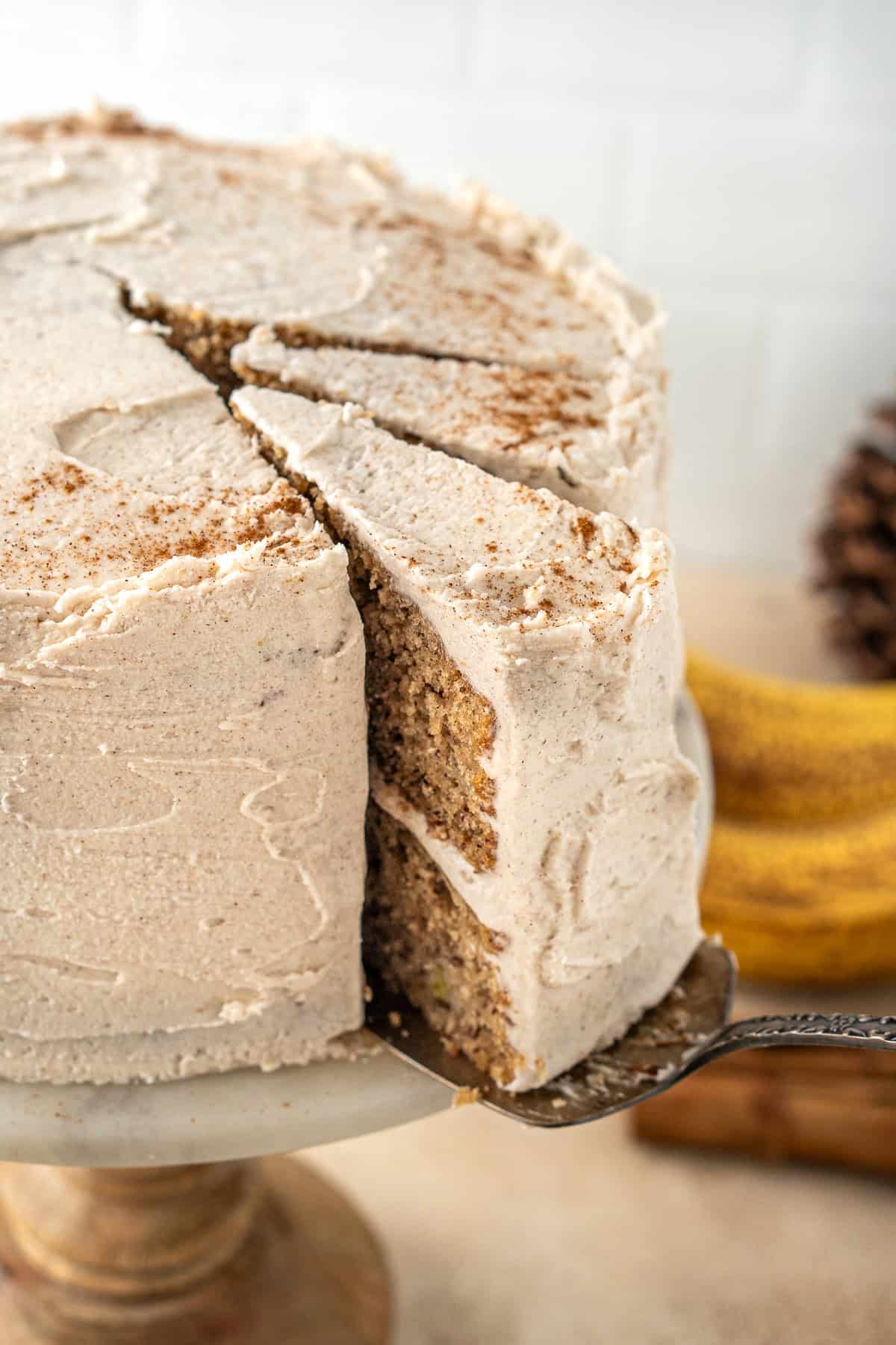 Serving out a slice of cake.