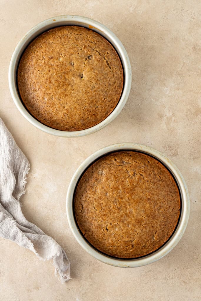 The cooked cakes in their pans.
