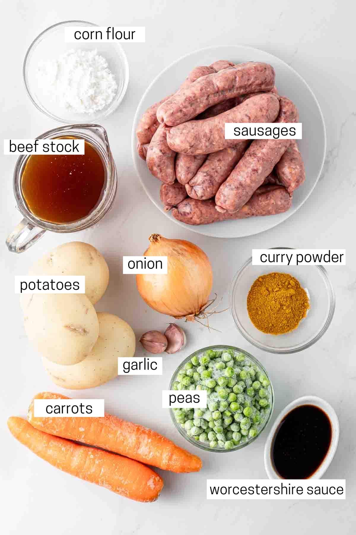 All ingredients needed for slow cooked curried sausages ready to cook.