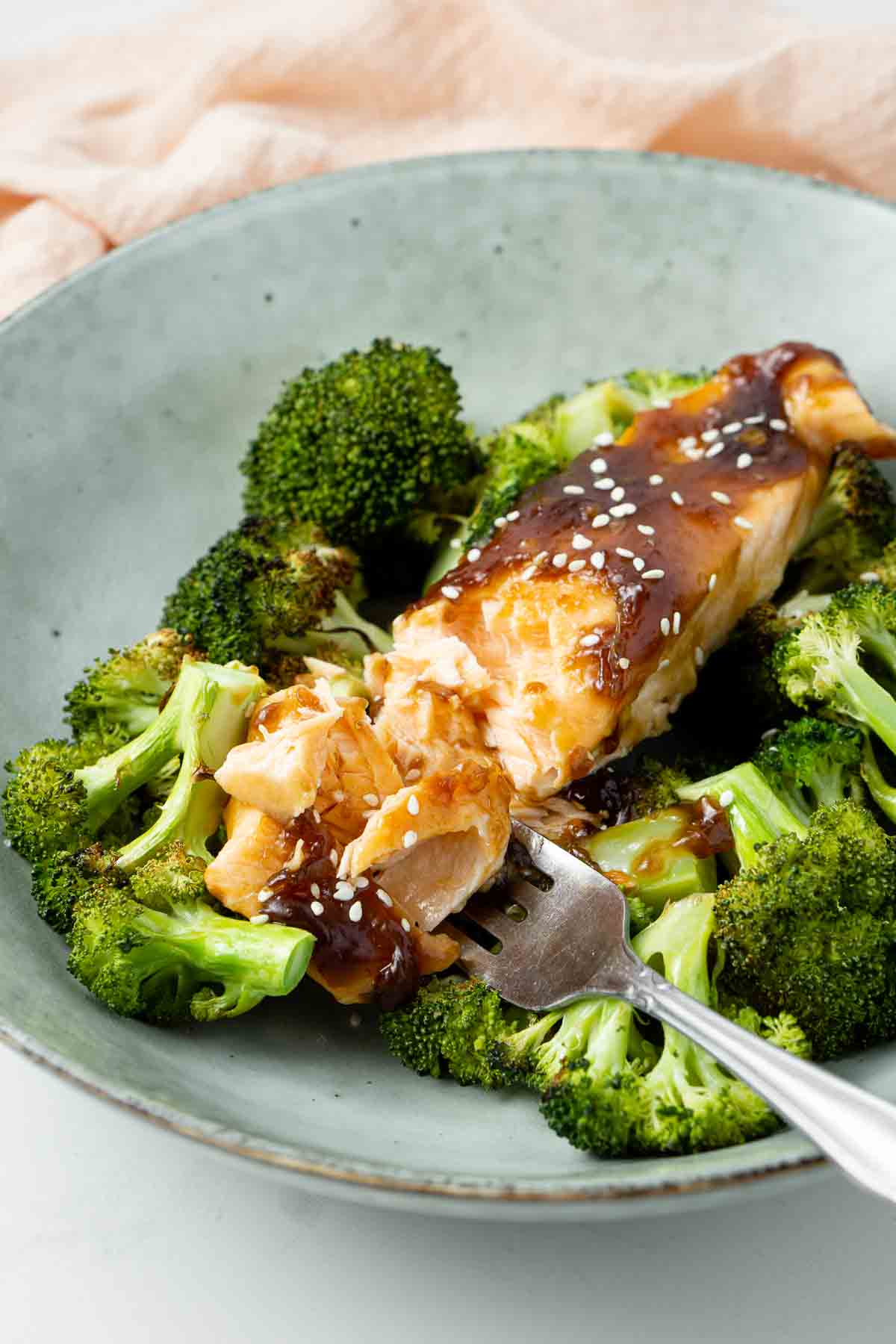 Flakey baked salmon on broccoli.