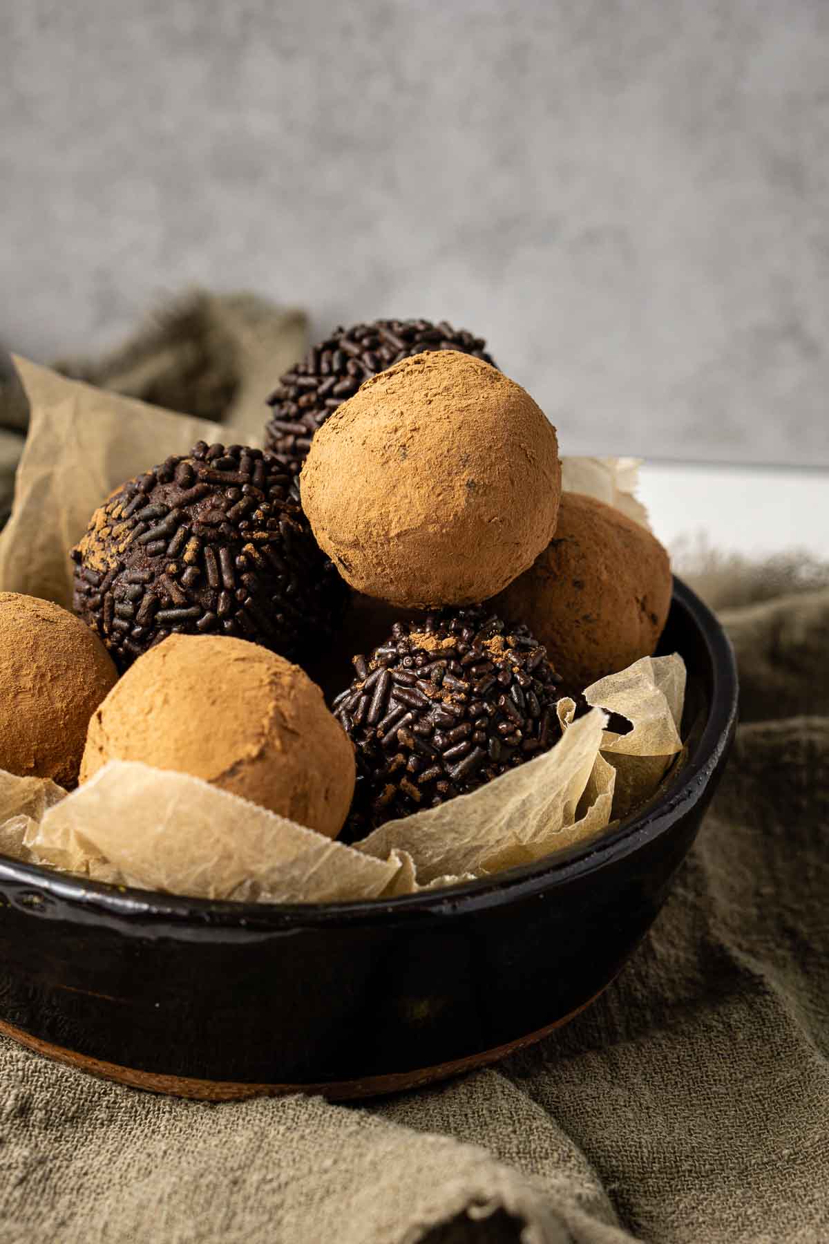 vegan dark chocolate truffles in a serving bowl