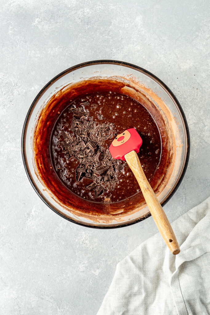 Adding the chopped dark chocolate into the batter.