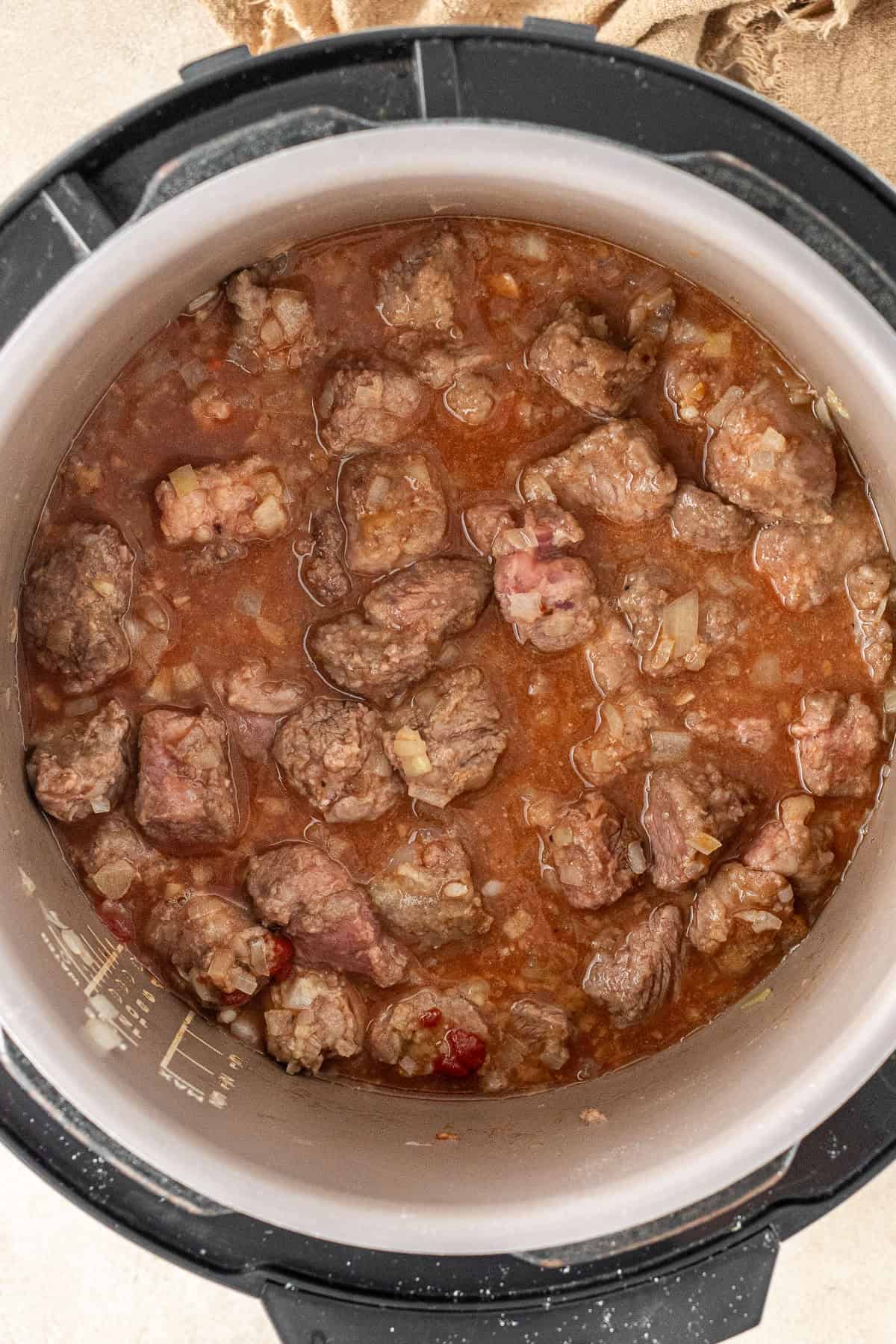 All ingredients mixed together in the pressure cooker.
