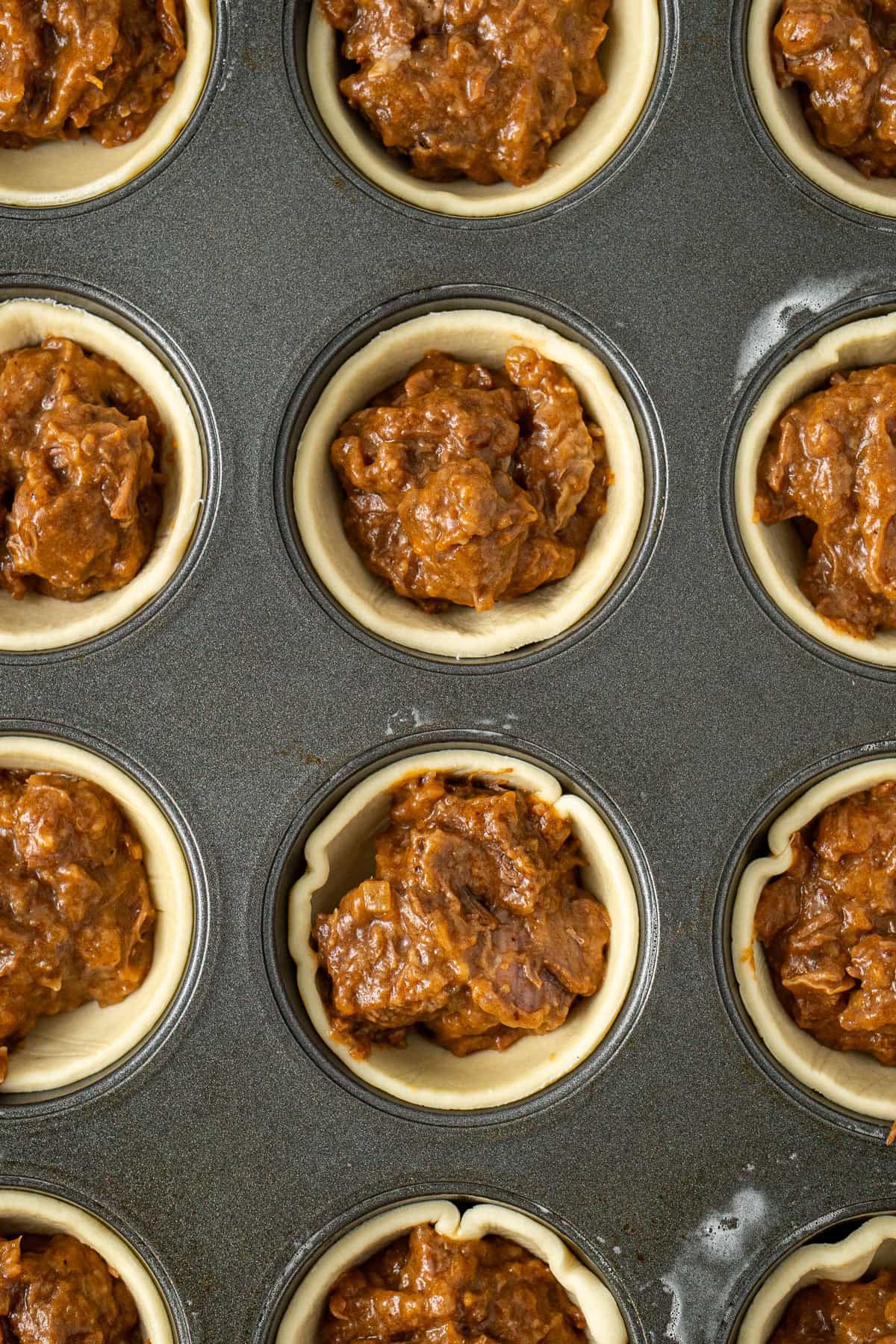 The pie filling in the pastry.