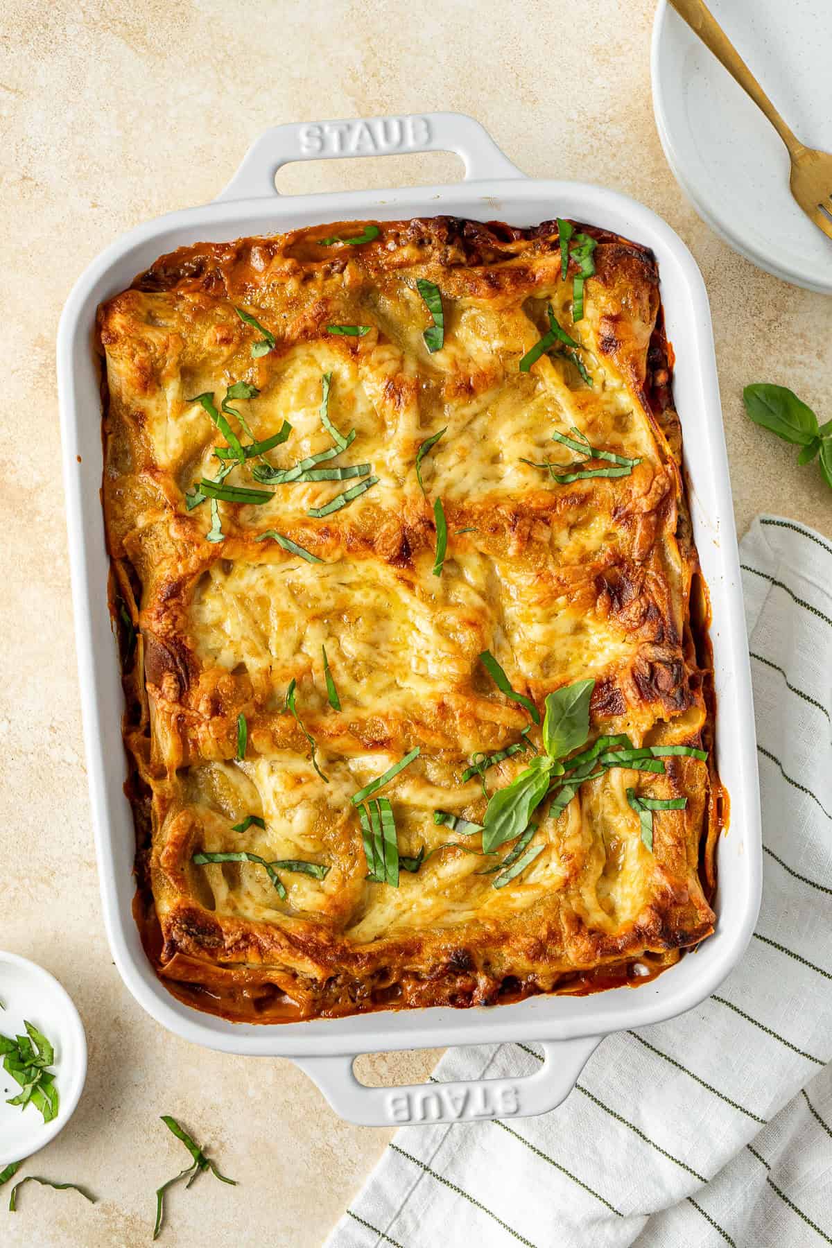 The baked lasagne with fresh basil.