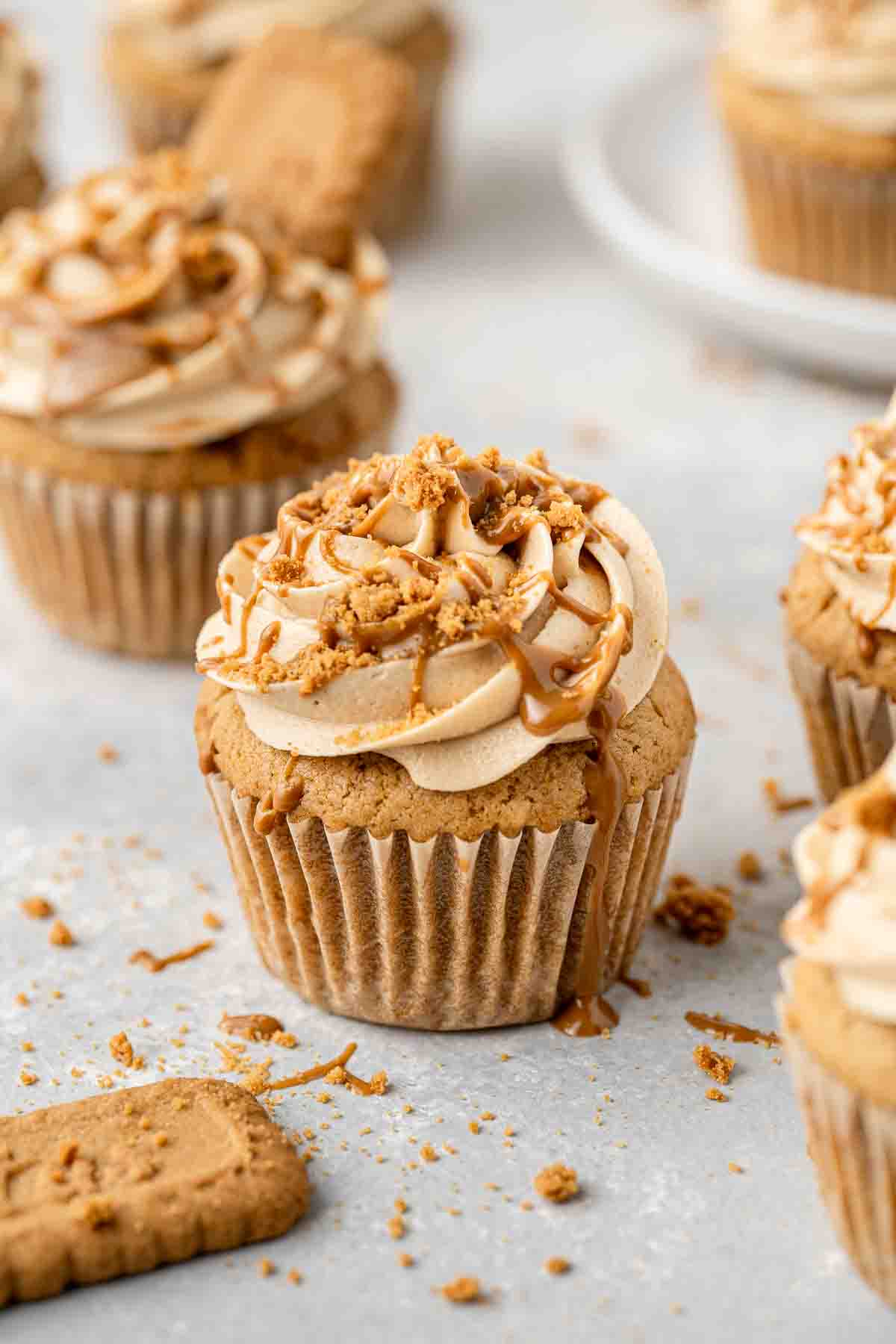 Close up of vegan biscoff cupcakes with extra biscoff drizzle.