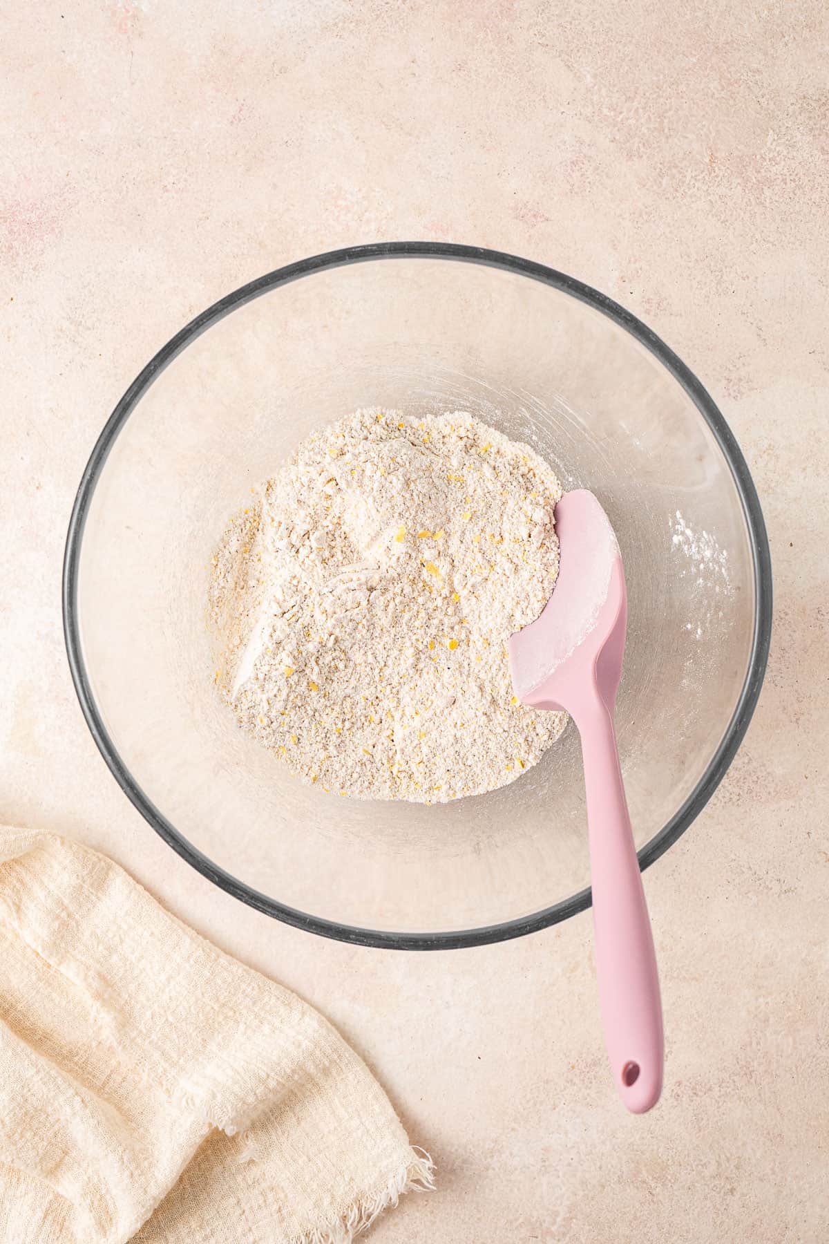 Mixing the dry ingredients in a bowl.